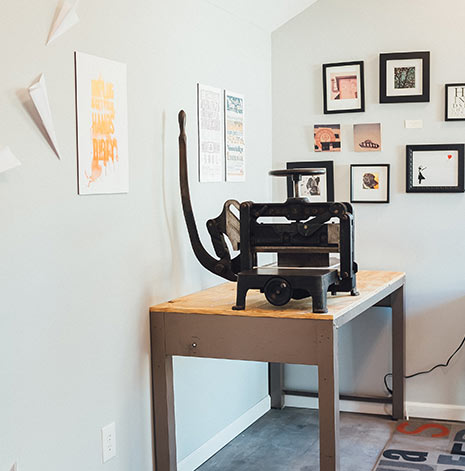 Vintage letterpress machine and type blocks